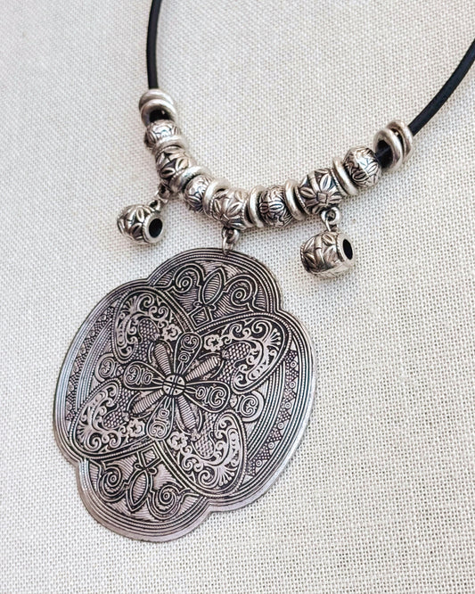 24-3199 Ornate Silver Medallion Necklace with Black Cord
